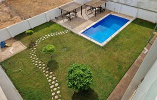 PISO CON JARDIN Y PISCINA COMUNITARIA photo 0