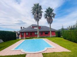 Vive la tranquilidad a un paso de Santander: espectacular chalet independiente en Camargo photo 0