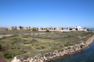 Parcela de 1.041 m² en primera línea del Canal de Veneziola en La Manga photo 0