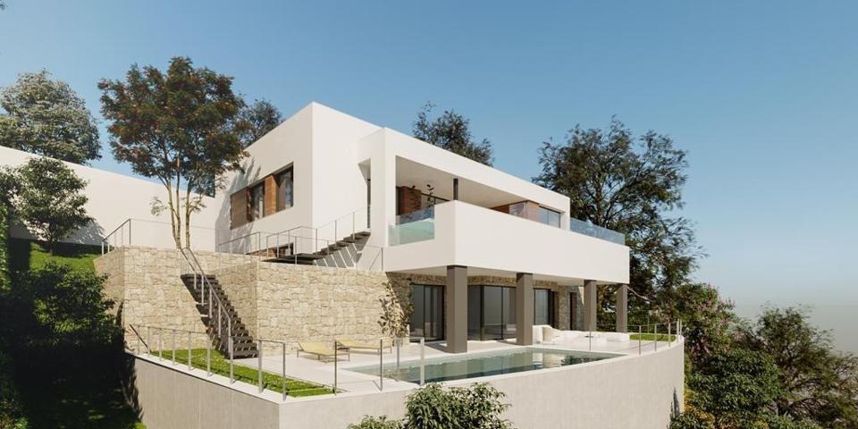 Fantástica parcela urbanizable en Elviria con un espectacular proyecto contemporáneo y licencia photo 0