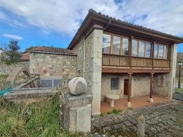 Exclusiva casa de Piedra con parcela cerrada con muro de piedra photo 0