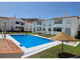 ¡¡ CON COCHERA !!..... Este apartamento en Urbanización con piscina photo 0