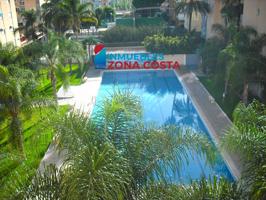Apartamento con piscina semireformado, en el paseo de playa Puebla de Farnals. photo 0