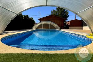 PRECIOSO Y AMPLIO CHALET CON PISCINA EN TRES CALAS photo 0