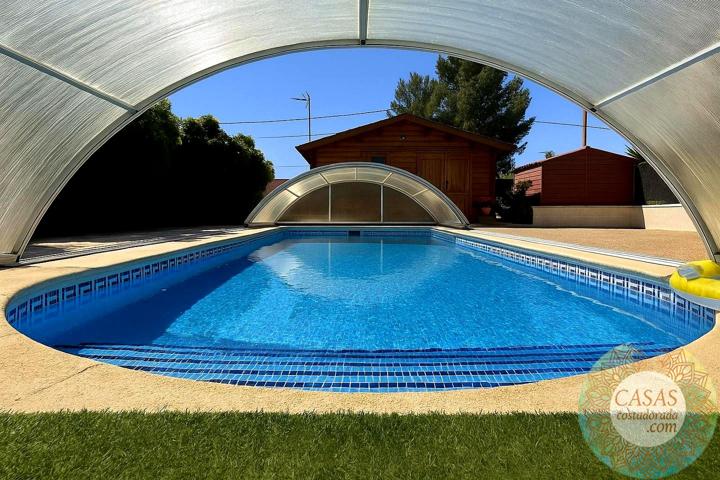 PRECIOSO Y AMPLIO CHALET CON PISCINA EN TRES CALAS photo 0