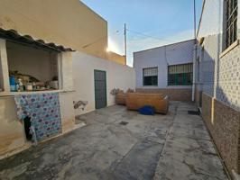 Venta de casa en planta baja con parcela para reformar a su gusto en Los Dolores photo 0