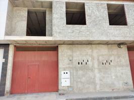 CASA CON ALMACEN EN CONSTRUCCIÓN. photo 0