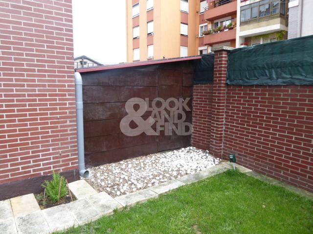 Impecable bajo con jardín de 140 m2 en Maliaño. photo 0