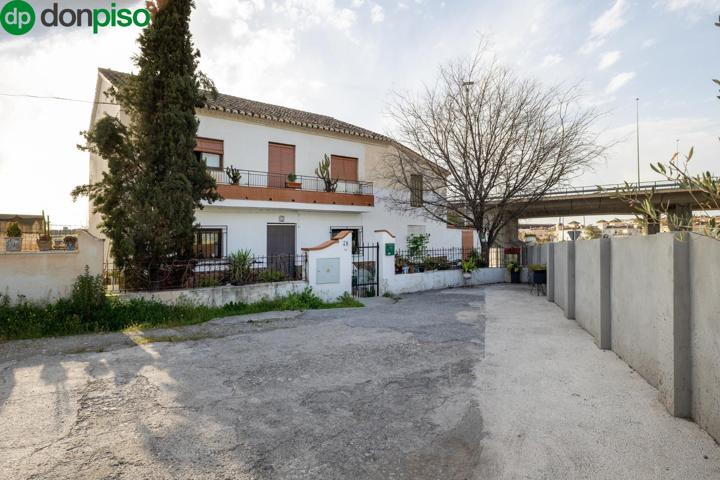 CASA CORTIJO CON PARCELA RÚSTICA DE RIEGO photo 0