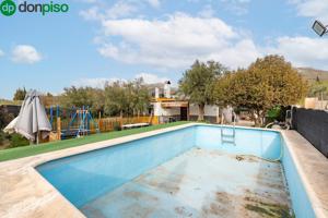 Casa con piscina en Cogollos Vega photo 0