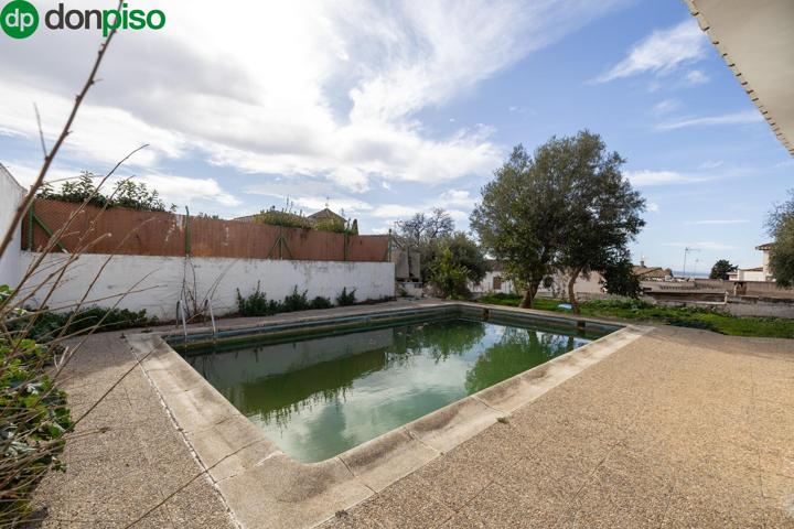 CASA EN PLANTA BAJA CON TERRENO EN ALBAYCÍN photo 0