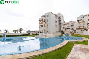 ¡Piso en Primera Línea de Playa en Roquetas de Mar con Piscina! photo 0