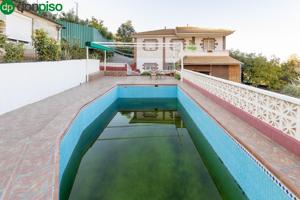 CHALET CON PISCINA Y DOS APARTAMENTOS EN COGOLLOS VEGA (GRANADA) photo 0