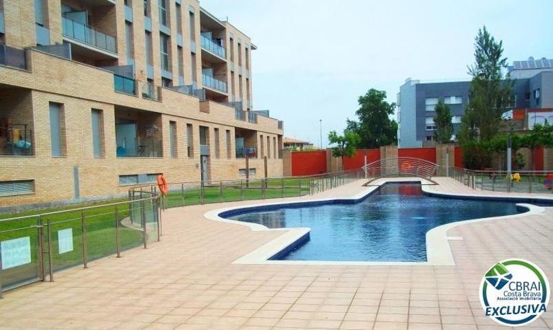 PUIG ROM Apartamento de dos dormitorios con piscina comunitaria, parking y solárium photo 0