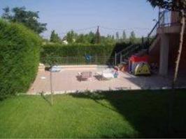 Chalet en venta en Baeza photo 0