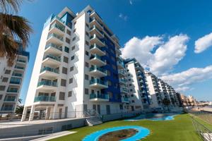 Apartamento con 2 dormitorios, 2 baños, piscina comunitaria y plaza de garaje en zona de La Manga photo 0