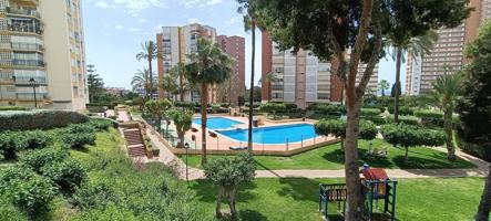 ACOGEDOR APARTAMENTO A 250 METROS DE LA PLAYA DE PONIENTE CON PARKING Y PISCINA photo 0
