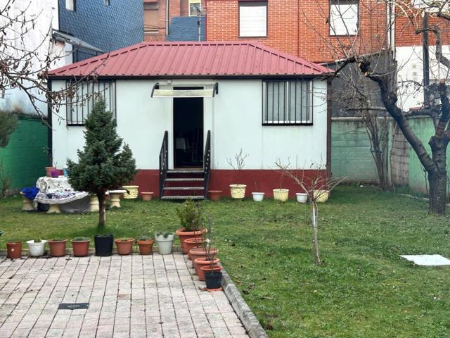 SE VENDE PARCELA URBANA CON CASA PREFABRICADA photo 0