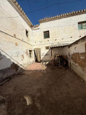 Amplio Adosado en el Centro de La Zubia - Oportunidad para Reformar photo 0