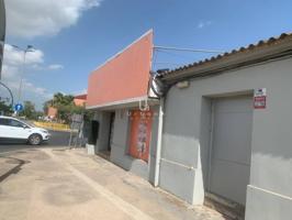 Vivienda y local comercial en una parcela de 267m2!! Posibilidad de construir. photo 0
