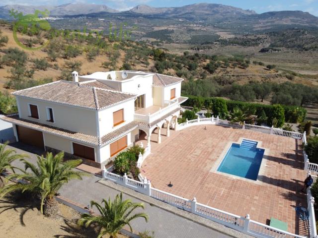 Villa En venta en Viñuela photo 0