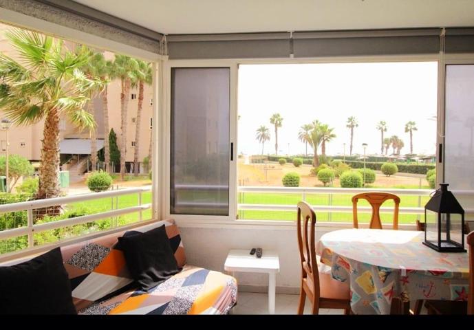 🌅 Vivir Frente al Mar: Exclusivo Piso en Primera Línea de Playa en Urbanova con Terraza, Vistas Espectaculares y Urbanización de Lujo. photo 0