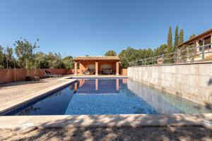 CHALET UNIFAMILIAR CON PISCINA Y VISTAS DESPEJADAS EN EXCLUSIVA URBANIZACIÓN EN BUNYOLA photo 0