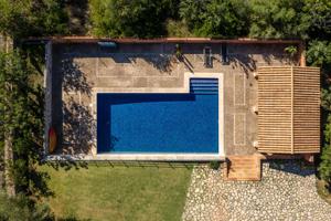 CHALET UNIFAMILIAR CON PISCINA , SOLAR ANEXO Y VISTAS DESPEJADAS EN EXCLUSIVA URBANIZACIÓN EN BUNYOLA photo 0