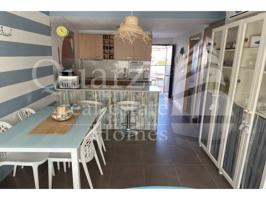 En venta casa adosada en Oliva Nova photo 0