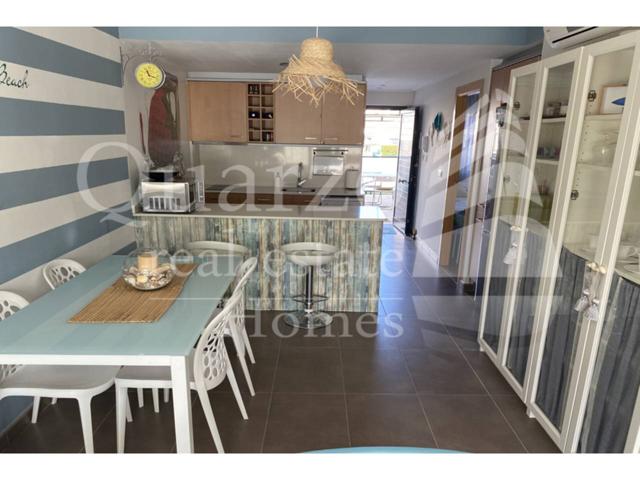 En venta casa adosada en Oliva Nova photo 0