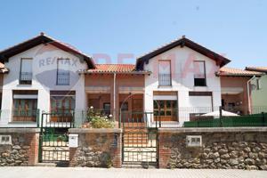 CHALET PAREADO CON GARAJE photo 0