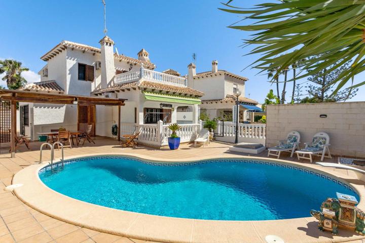 Unifamiliar En venta en Cabo Roig, Orihuela Costa photo 0