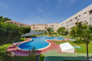 Apartamento cerca de playa con piscina y garaje photo 0