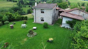 CONJUNTO CHALET,HORREO,CUADRA,FINCA CON V.V. EN ISONGO (CANGAS DE ONÍS) photo 0