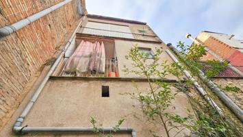 Casa de pueblo plurifamiliar para reformar en el centro de Navarcles photo 0