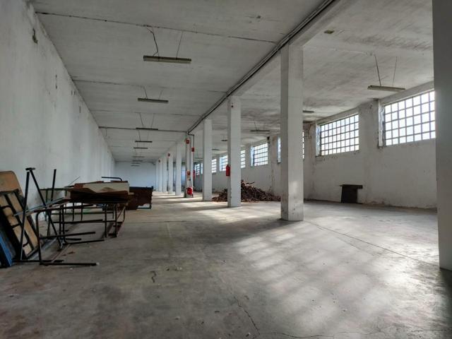Nave Industrial Polivalente en Teo: Un inmueble con posibilidades interesantes. photo 0