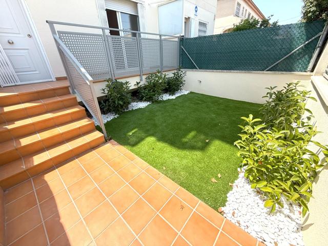 Planta baja a estrenar con jardín y terrazas 3ª línea de mar Can Toni photo 0