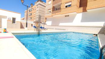 PISO REFORMADO EN AGUADULCE SUR CON PISCINA COMUNITARIA, PLAZA DE GARAJE Y TRASTERO JUNTO AL MAR. photo 0