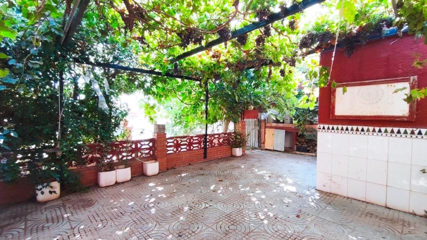 CASA DE PLANTA BAJA CON PARCELA Y JARDIN. photo 0