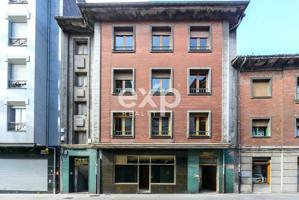 Edificio en venta en el centro de El Entrego – Oportunidad para inversores photo 0