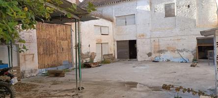 SOLAR URBANO EN EL CENTRO DE CHURRIANA DE LA VEGA photo 0