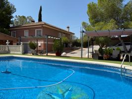 Chalet independiente en El Pino, Dos viviendas por el precio de una photo 0