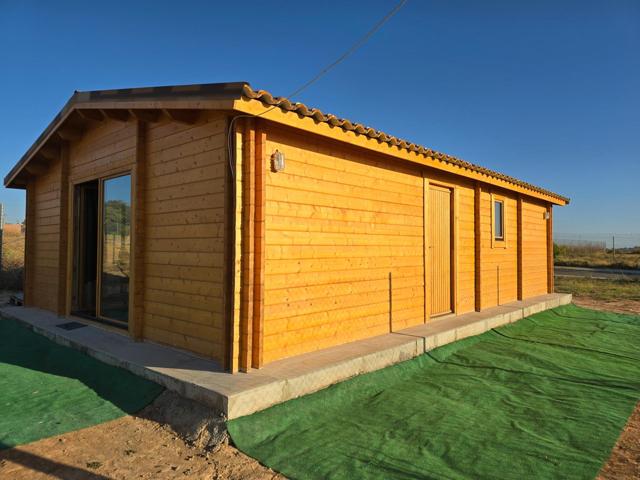 Casa de Madera con terreno en Palomares del Río. photo 0