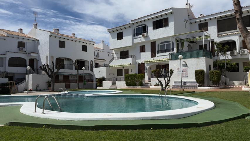 Bungalow en planta baja de 1 dormitorio en urbanización cerrada en pleno corazón de Playa Flamenca photo 0