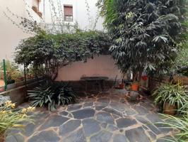 Fantástica casa adosada con jardin y garaje. photo 0