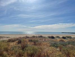 FANTÁSTICA PLANTA BAJA CON PISCINA COMUNITARIA EN PLATJA DE PUÇOL photo 0