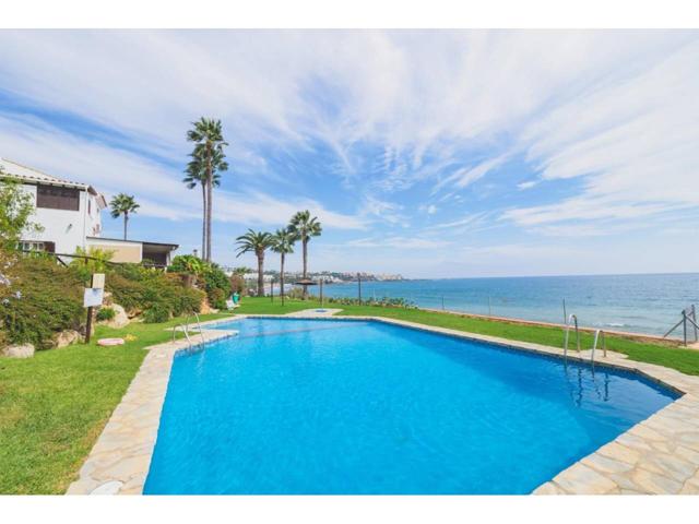 Venta de una casa en Estepona, primera linea de playa photo 0