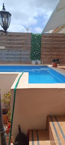 Vive la tranquilidad y el confort en este amplio chalet adosado en La Nucía photo 0