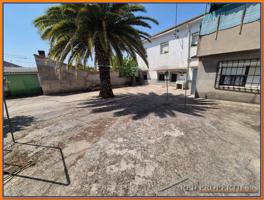 CASA DE PUEBLO CON 2 VIVIENDAS INDEPENDIENTES Y PARCELA photo 0