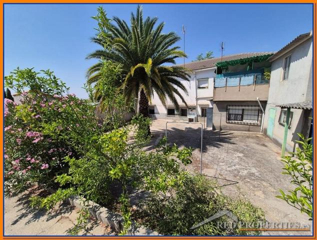 CASA DE PUEBLO CON 2 VIVIENDAS INDEPENDIENTES Y PARCELA photo 0